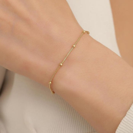  Analyzing image     goldarmband-damen-585-echt-14-karat-gold-bulk-tondo-armband-goldperlen