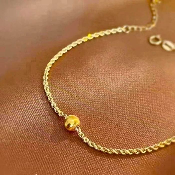 goldarmband-damen-750-gold-armband-18k-gold-authentic-katze-augen-perlen-twisted-armband-feiner-schmuck